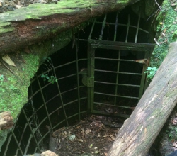 sixpenceee:  voltagestruck:  sixpenceee​,  some friends and I were hiking by some cave systems near our home and we found this. I’m not sure if its purpose is to keep us out or something else in…    creepy!
