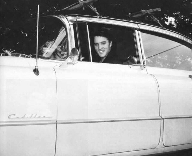 candidelvis:  Elvis and his Cadillac.  Taken at his home on Getwell Road in Memphis,