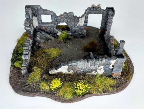 Some cute little ruins from Warlord Games, dolled up with some old school Warhammer Empire bits.