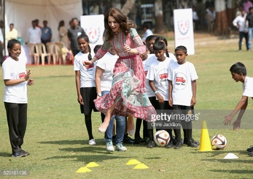 The Duchess of Cambridge shows her playful side as she plays cricket with children from Magic Bus, C