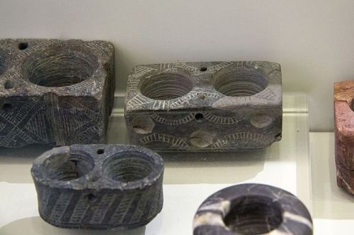 bronze-age-aegean: Stone kernos. 3000-1900 BC. Found in Mesara, Crete. Currently in the Archaeologic