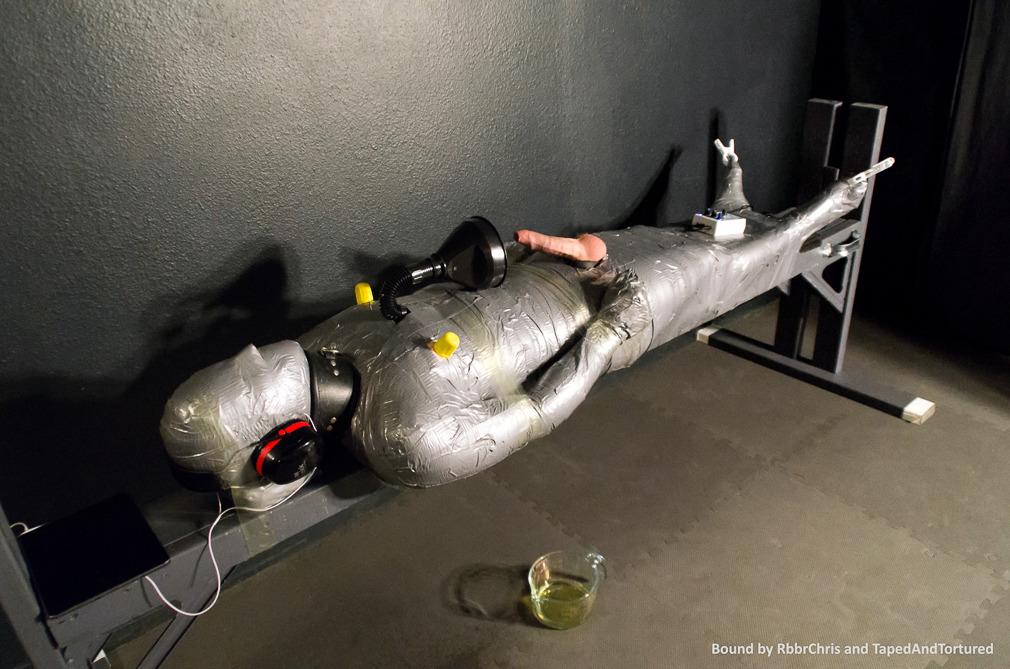 tapedandtortured:We used a funnel to get the piss underneath the tape.and pallet