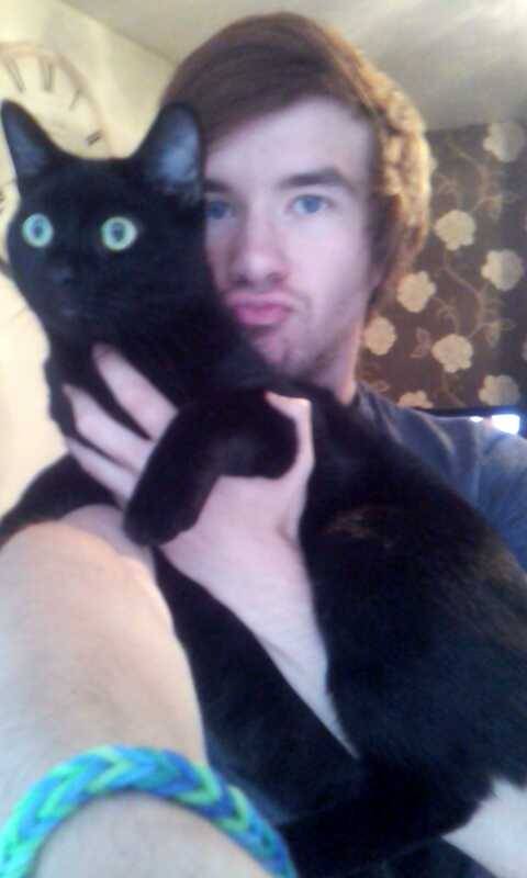 sombre-songbird:Me and my cat ,Oscar, who hates me (but loves me at night when theres
