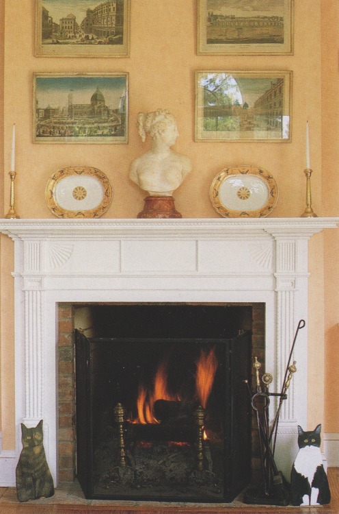 vintagehomecollection: The fireplace in the dining room has a symmetrical arrangement on the mantel.