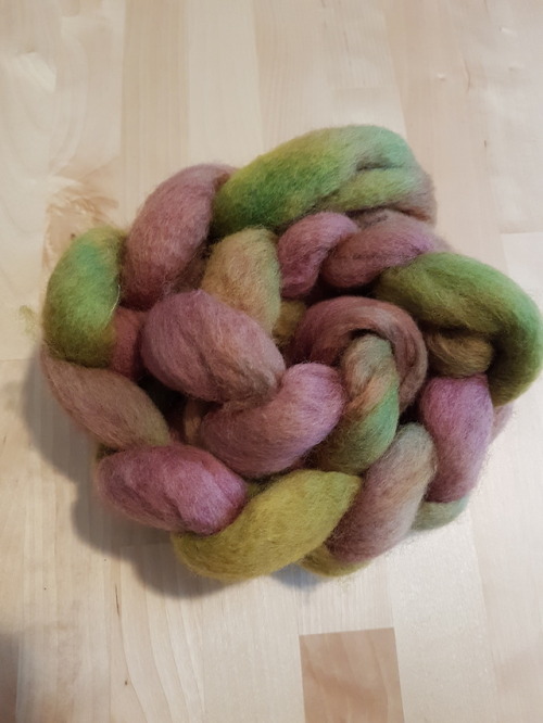 Rose Garden roving. Pale pink and green. Spring is here!www.longdrawyarn.ca