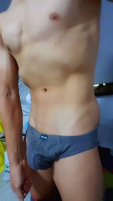 asianstr8guynudes:  asianstr8guynudes:  Who is this big bulge gymnast from sg 😉  dm for his vids ;)