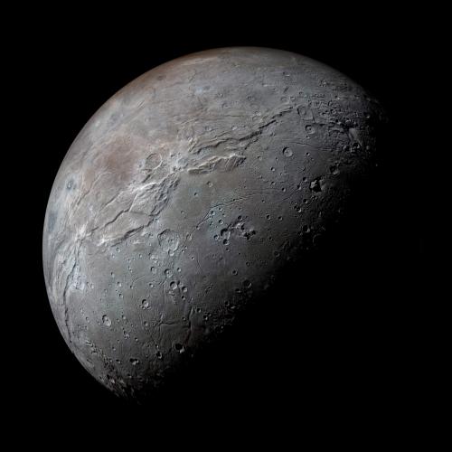 photos-of-space:Pluto’s moon, Charon. It has half the diameter of Pluto, and is so large that the tw