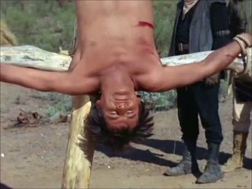 The High Chaparral S01E24 Manolito (Henry Darrow) undergoes a painful test of courage to secure the 