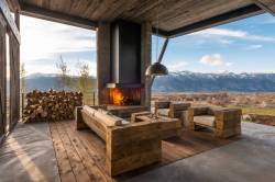 Stylish-Homes:  Outdoor Room With Fireplace And A Beautiful View Of The Mountain