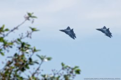 Russian-Military:  Russian Pak Fa Fighter Jets Fly With Externally Mounted Armaments