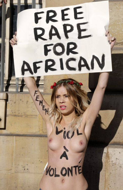 breedingthewhitesaway:  blackbreedingonly:  A European woman protesting in support of increased African immigration.  Oh nice   This a worthy fight.Foreigners like African Immigrants shouldn’t live under the tyranny of  the whites’ laws.