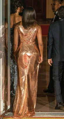 youngblackandvegan:  brown-nena:  accras:    The gorgeous back of Michelle Obama’s custom-made, rose gold chainmail Atelier Versace gown.  She looks like a bottle of the most expensive champagne ever   brains, beauty and booty. gahtdamn Michelle