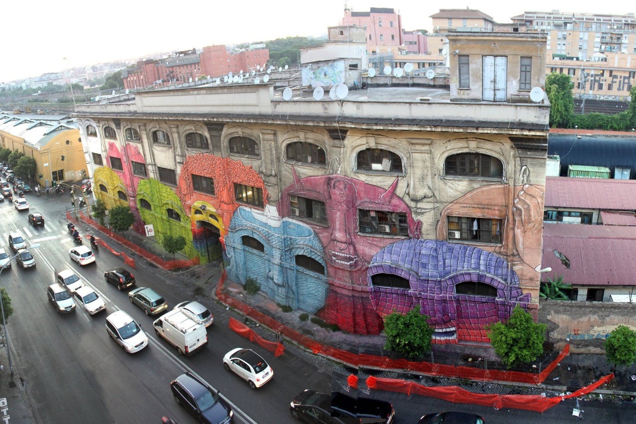 exhibition-ism:  Blu hits an old military warehouse in Rome with this massive mural 