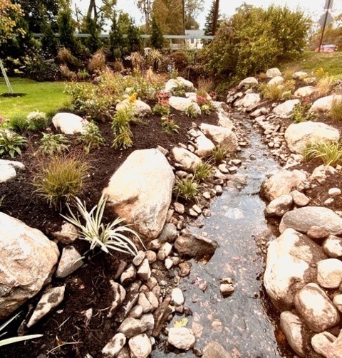 Landscape - Rock FeaturesThis Is An Illustration Of A Medium-sized Front Yard With River Rock Landscaping
