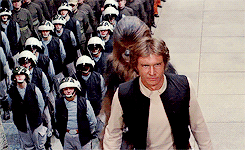 carriefishers-archive:  Han turns to his companion, CHEWBACCA, an eight foot tall, savage-looking creature resembling a huge gray bush-baby monkey with fierce “baboon”-like fangs.  His large yellow eyes dominate a fur-covered face and soften his