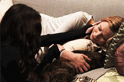 :  I tightened my grip on her arm, digging my nails in to get her attention. She flinched.