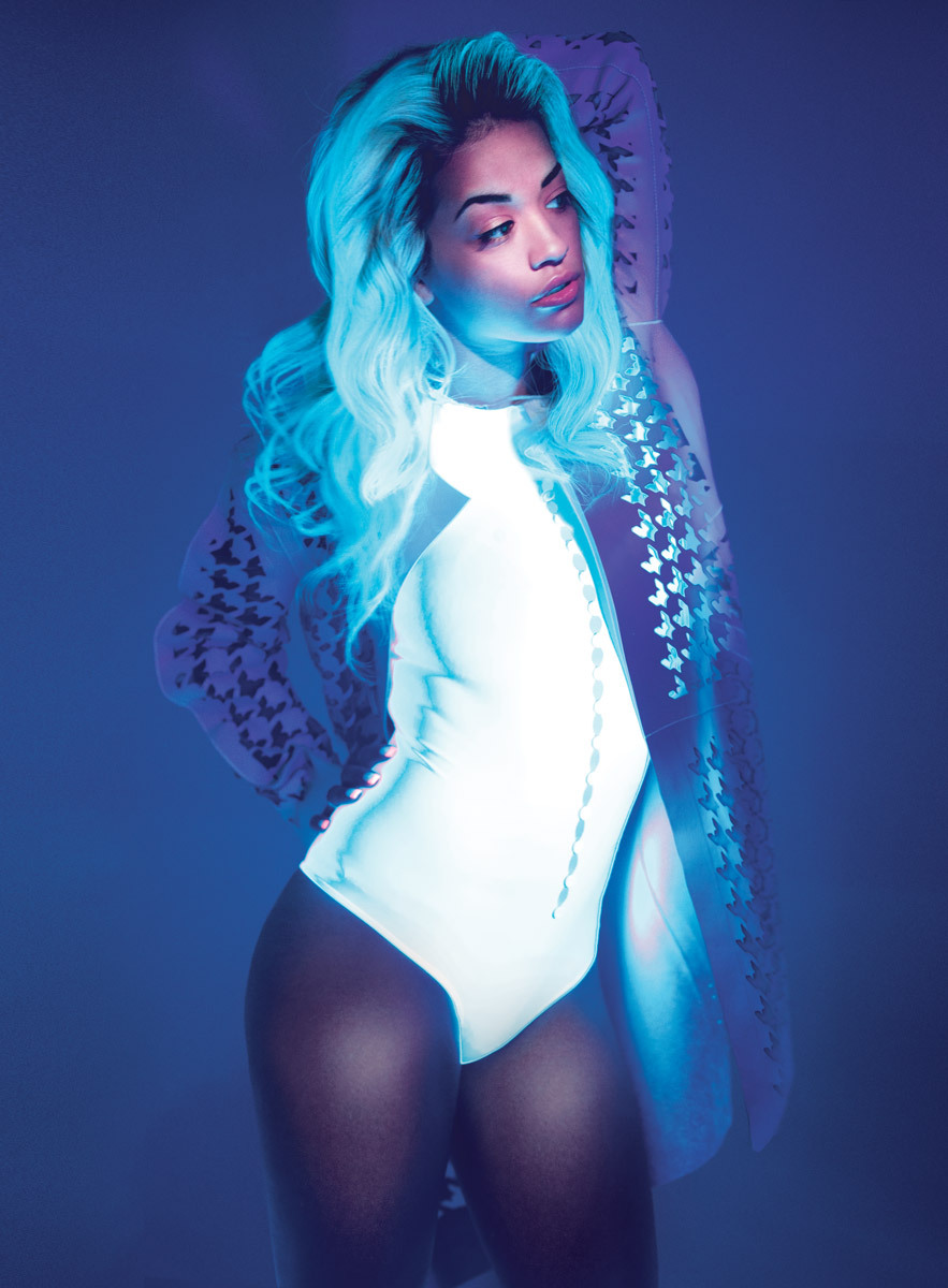 noblebeast:  British singer-songwriter Rita Ora giving off a blue glow under blacklight