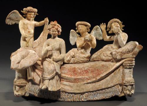 hellenismo:Two Erotes, a female musician, and a crowned man. (From Hellas, Ca. 3rd-2nd Century BCE, 