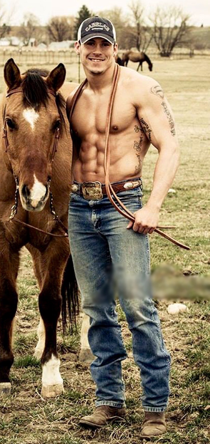phd-bullrider:  Nice six-pack cowboy! Miller-time on your stomach.