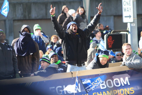 wwywinytm: This photo is too priceless to me of Richard Sherman during the Seahawk Parade today.&nbs