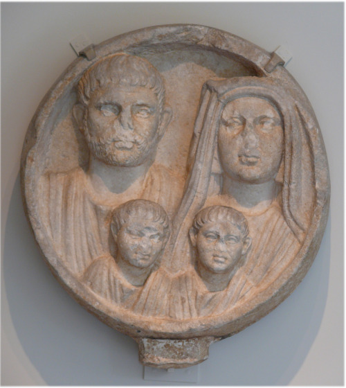 Roman funerary relief depicting a couple with their children.  Artist unknown; 2nd or 3rd cent.