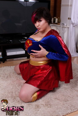 Dors-Feline:  Abundant Tit Star Dors Feline Squeezes Her Immense Rack Into Her Superwoman