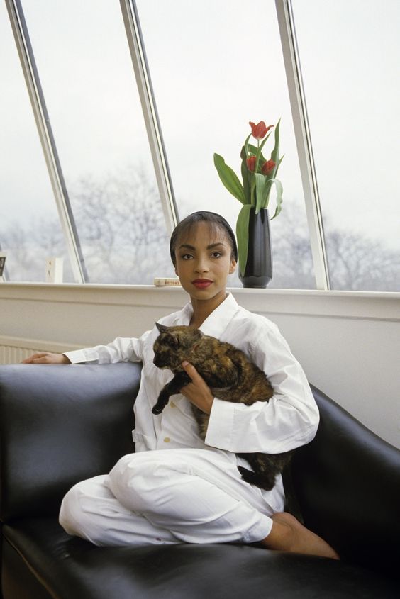 twixnmix:  Sade photographed by Jean-Claude Deutsch at home in London, 1985. 