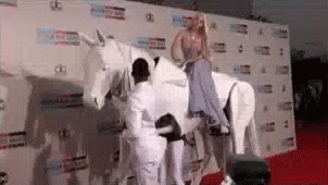 yahooentertainment:  On a Horse: Lady Gaga arrives at the 2013 American Music Awards.