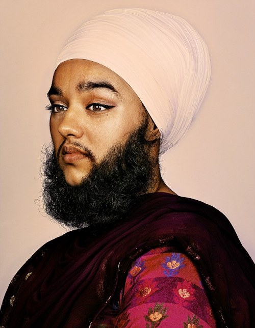 thetigerbeat:  British woman Harnaam Kaur started growing facial hair at 16 as a side effect of polycystic ovary syndrome. She tried waxing, shaving and bleaching before being baptised a Sikh, which forbids the cutting of body hair. Photograph: Brock