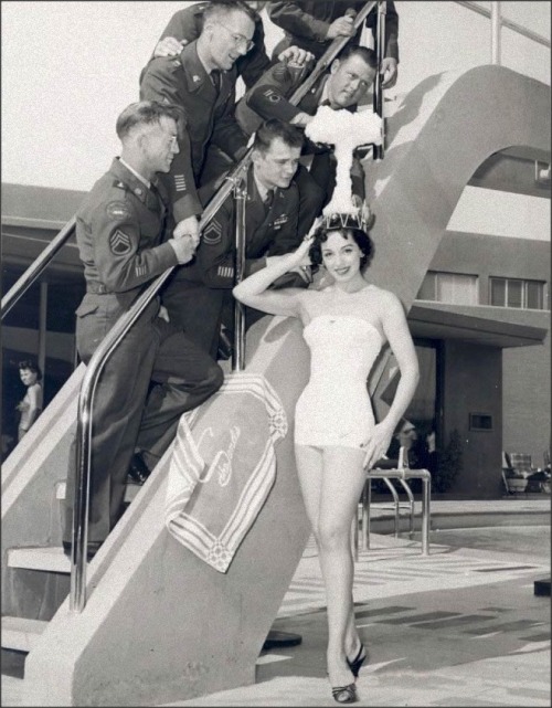 1950sunlimited:  Sands Hotel Copa Girl Linda Lawson, wearing A-Bomb Crown, is crowned “Miss Cue” to illustrate another mis-firing of the Operation Cue Bomb. 1955 