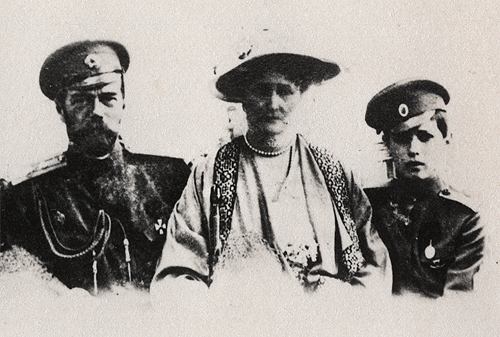 romanovsonelastdance: Nicholas II with his wife and son.
