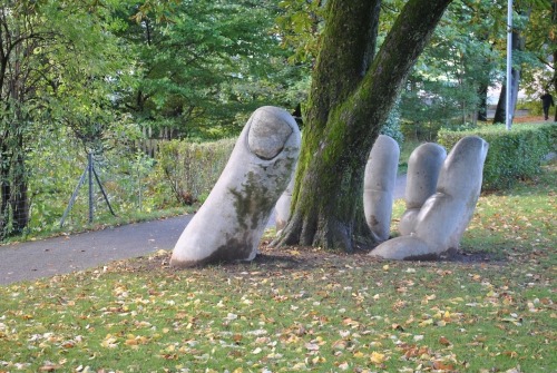 sixpenceee:This amazing sculpture is called The Caring Hand and is located in Glarus, Switzerland.