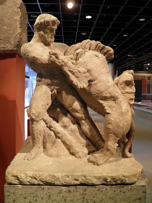 Fragment of an ancient Roman funerary monument depicting Hercules overcoming the Nemean Lion.  Now i