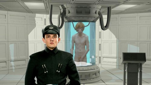 Lieutenant Mitaka trying to save General Hux after he was shot. Hux is in the bacta tank with Mitaka