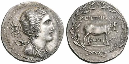 Stephanophoric silver tetradrachm of the Euboean polis of Eretria.  On the obverse, a bust of Artemi