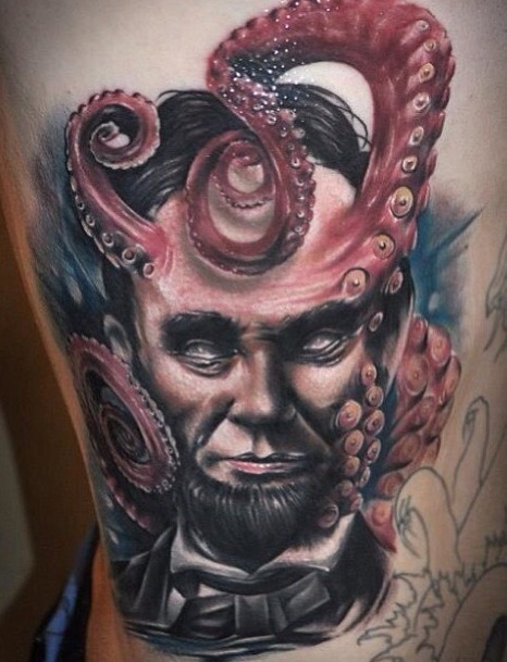 fuckyeahtattoos:  Octo Lincoln on the other side of my ribs done by Ben Laukis from
