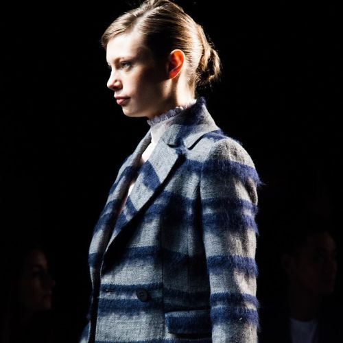 A structured bun complimented simple suiting at @taoraywang Fall/Winter &lsquo;16. #NYFW | #: @f