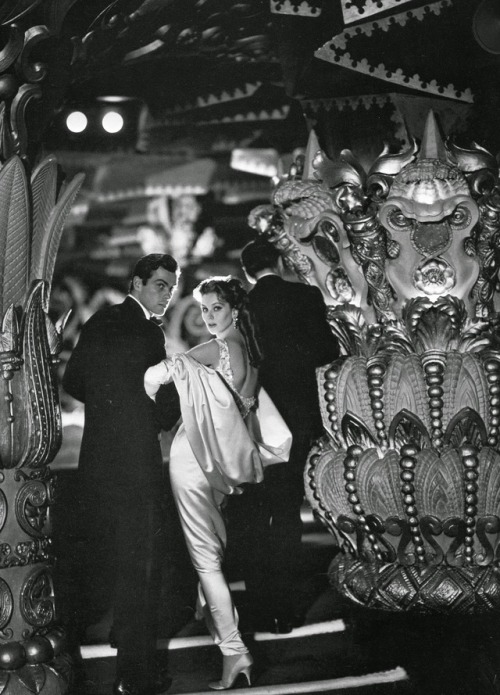 Gardner McKay and Suzy Parker in evening dress by Patou , photo by Avedon at Le Sheherazade, Paris, 
