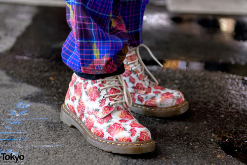 Japanese DJ and pianist Ohshi on the street in Harajuku wearing a plaid suit by MalkoMalka with a ca