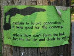 girahffe:  nsaney:  Tree Hugger Sign Explain to future generations it was good for the economy . When they can’t farm the land, breath the air and drink the water.  oh my gosh 