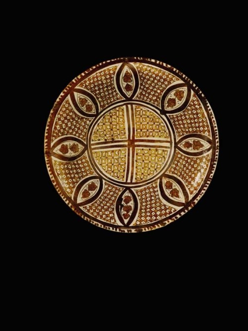 9th century Abbasid lustre bowl with geometric and stylised vegetal decoration from Iraq.