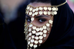 biladal-sham:  A woman attends the Janadriyah Cultural Festival on the outskirts of Riyadh, Saudi Arabia.	Faisal Al Nasser/Reuters