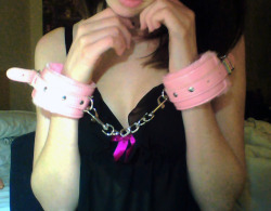 cutesexkitten:  my pink fluffy cuffs :3 ~kitten  