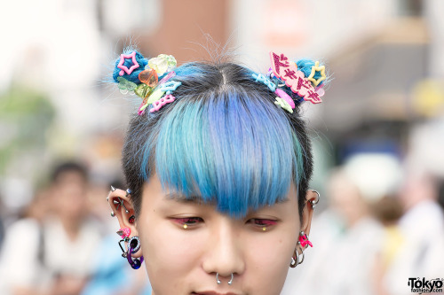 tokyo-fashion:  6%DOKIDOKI shop staff Kanata on the street in Harajuku wearing a Kinji Hello Kitty jacket over a manga-print top from Park Harajuku, piercings, mismatched socks, and 6%DOKIDOKI hair accessories. Full Look