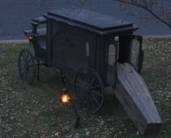 congenitaldisease:  The Death Coach, also known as the Coach-a-bower or Coshta-Bower, is a staple in Irish folklore. It is a large, black horse drawn hearse, pulled by six black stallions. In some tellings of the story, these stallions have no head. 