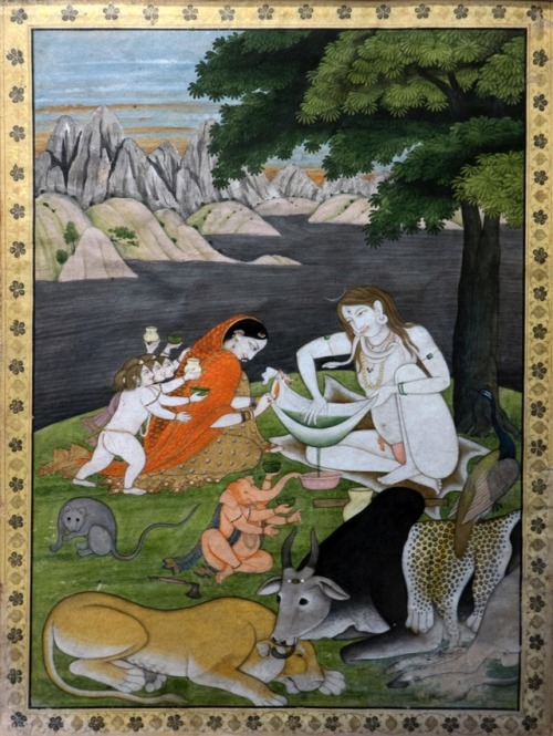 Shiva and Parvati making bhang with family