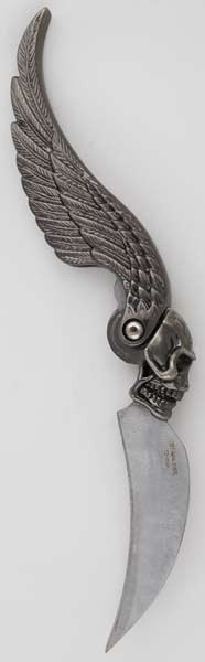 arcane-attic:  [Skull Wing athame | Arcane Attic] A 2 1/2” curved blade is contained