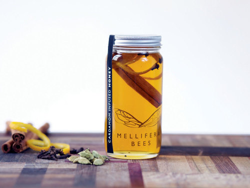 Designer Kiki Falconer created logo and packaging design for a producer of handcrafted honey infusio