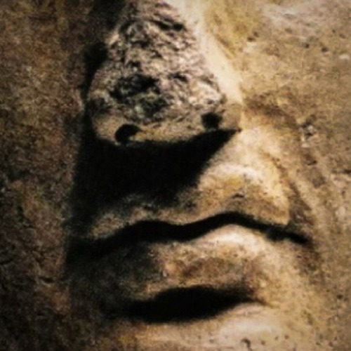 Head of a man Campania, 3rd century BC. The head of a young man with wavy hair falling ove