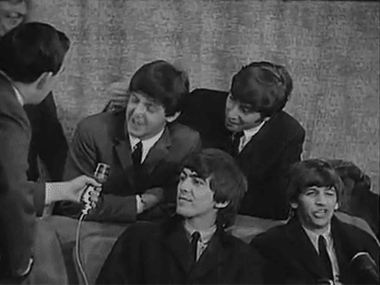 beatles-memes:John touches Paul’s ear and he thinks it’s the guy behind him (X)and then there’s Ring